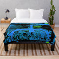 Trampolim Plush Blanket with vibrant abstract design and pop culture elements