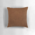 Artfully textured leather-inspired decorative pillow