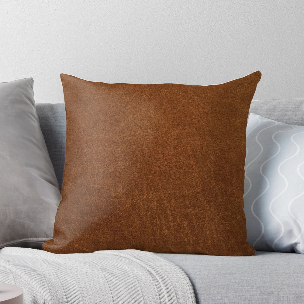 Artfully textured leather-inspired decorative pillow