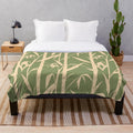 Hand-drawn Japanese bamboo leaves design on a plush, eco-friendly blanket
