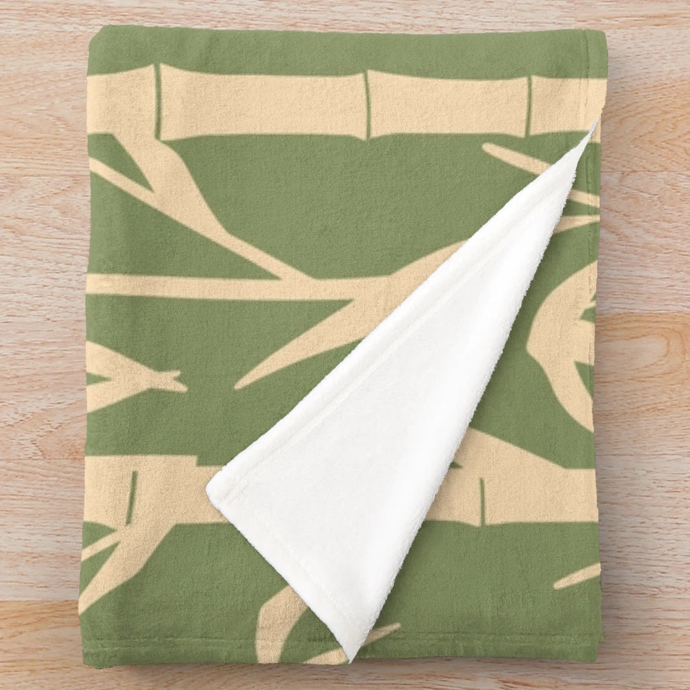 Hand-drawn Japanese bamboo leaves design on a plush, eco-friendly blanket