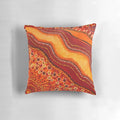 Vibrant orange and brown aboriginal inspired design pillow