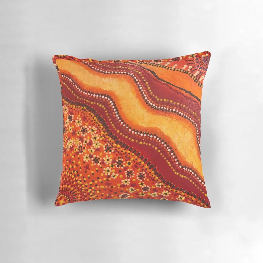 Vibrant orange and brown aboriginal inspired design pillow
