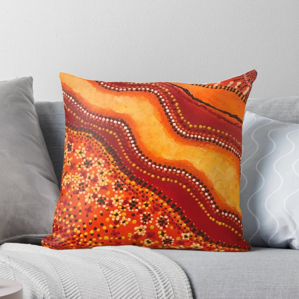 Vibrant orange and brown aboriginal inspired design pillow