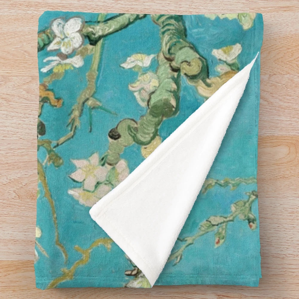 Plush blanket with a vintage van Gogh-inspired almond blossom artwork