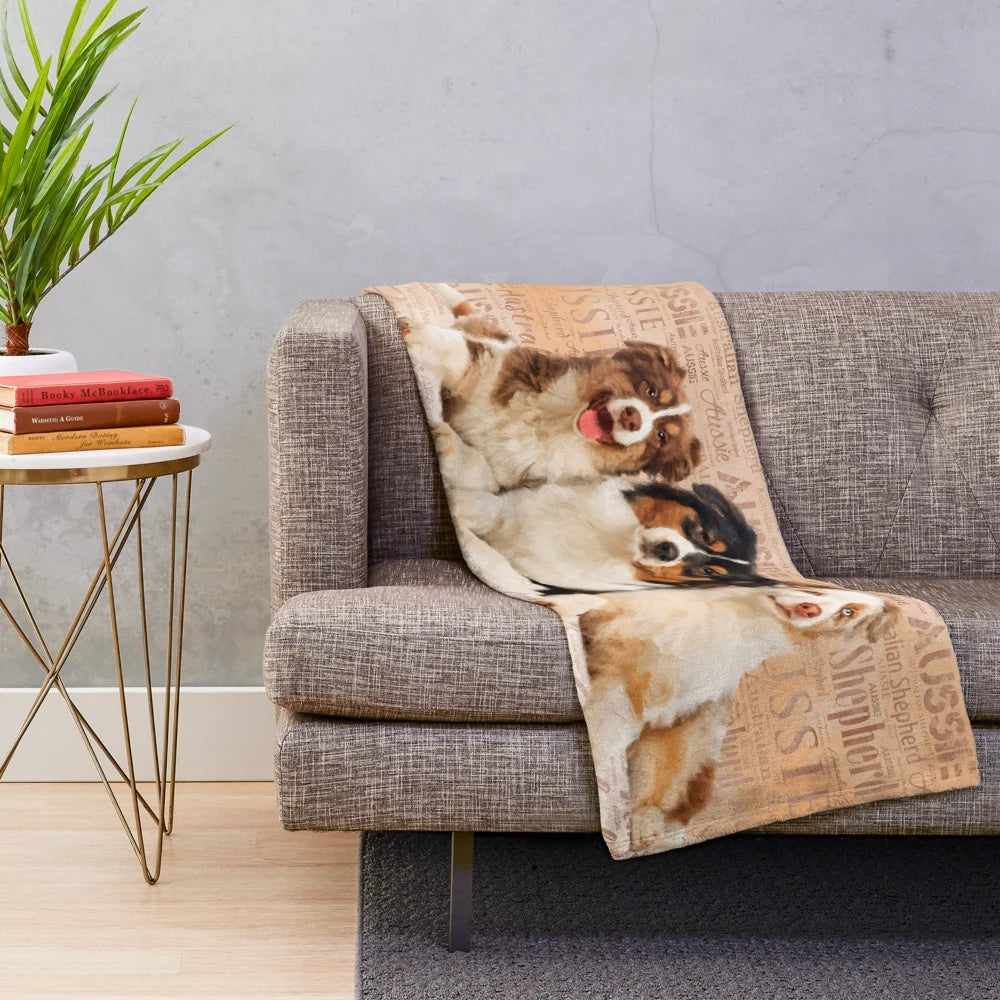 Artistic Australian Shepherd dog portrait on a plush blanket
