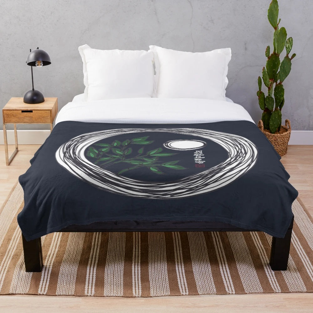 Plush blanket with hand-drawn bamboo and moon illustration