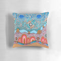 Pillow featuring indigenous-style dot painting design with ocean and landscape elements