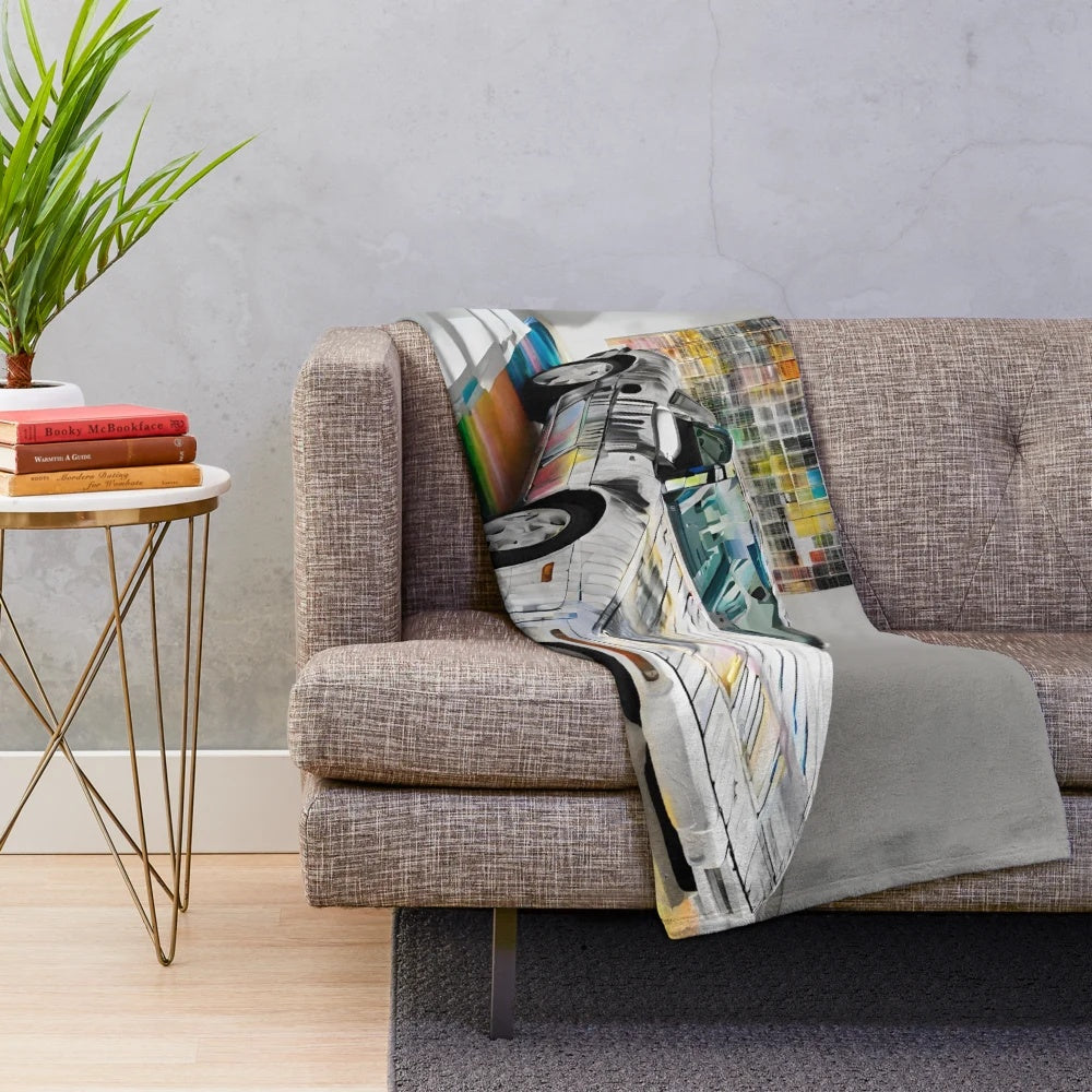 Plush blanket featuring an abstract minimalist painting of a car in a vibrant color palette