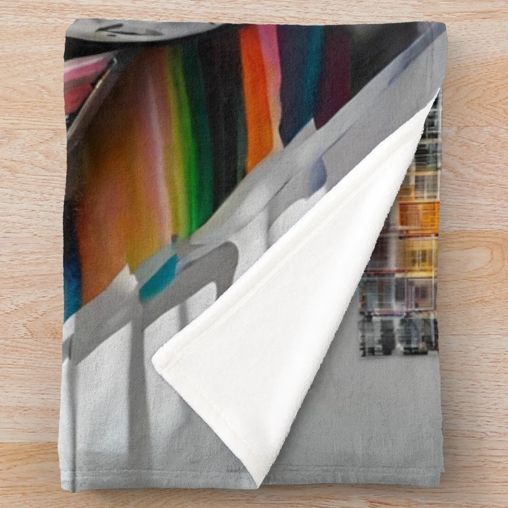 Plush blanket featuring an abstract minimalist painting of a car in a vibrant color palette