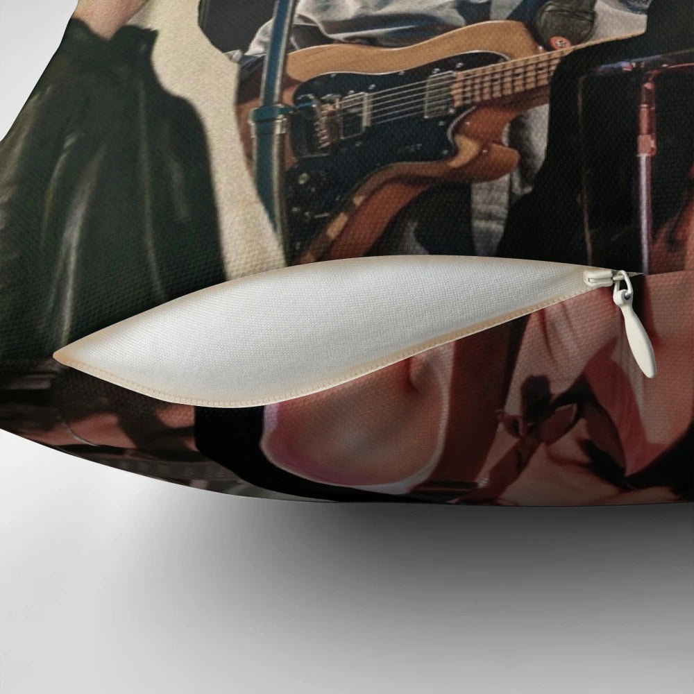Colorful collage-style pillow featuring images and artwork of Arctic Monkeys singer Alex Turner