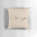 A decorative throw pillow featuring a sketch-style design inspired by Michelangelo's famous Renaissance artwork, "The Creation of Adam".