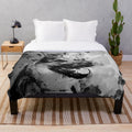 A plush blanket featuring an artistic German shepherd dog in an old Japanese ink painting style.