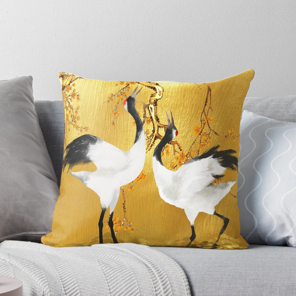 Decorative pillow with a vibrant Japanese crane and floral pattern design