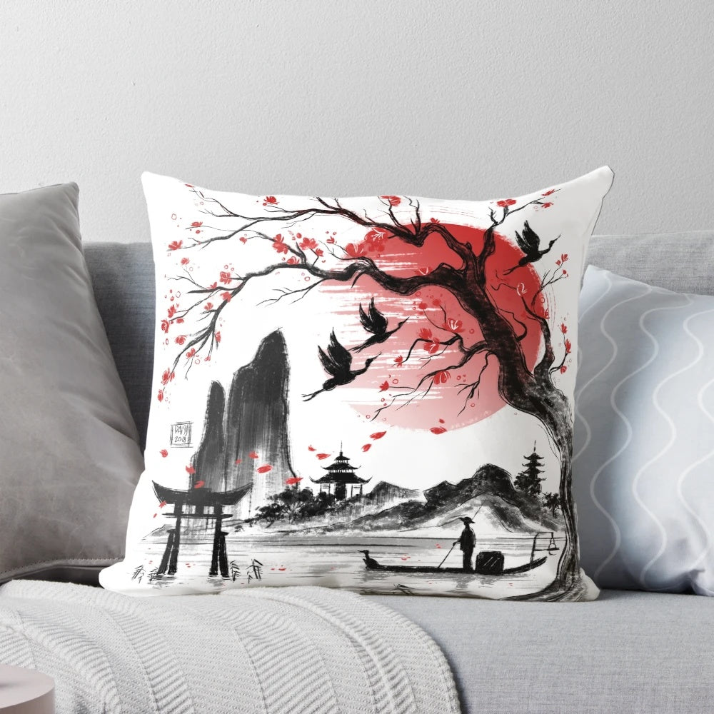 Decorative pillow featuring a Japanese landscape illustration with sakura flowers and a red sun.
