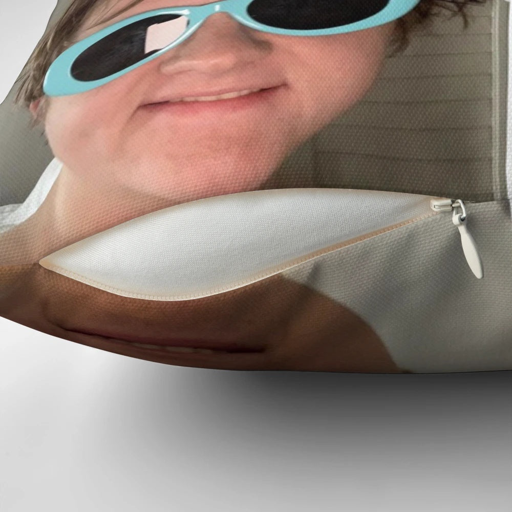 A collage-style portrait of singer-songwriter Lewis Capaldi printed on a decorative throw pillow.