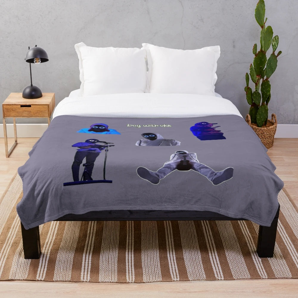 Cozy plush blanket with a vibrant illustration of a boy playing a ukulele