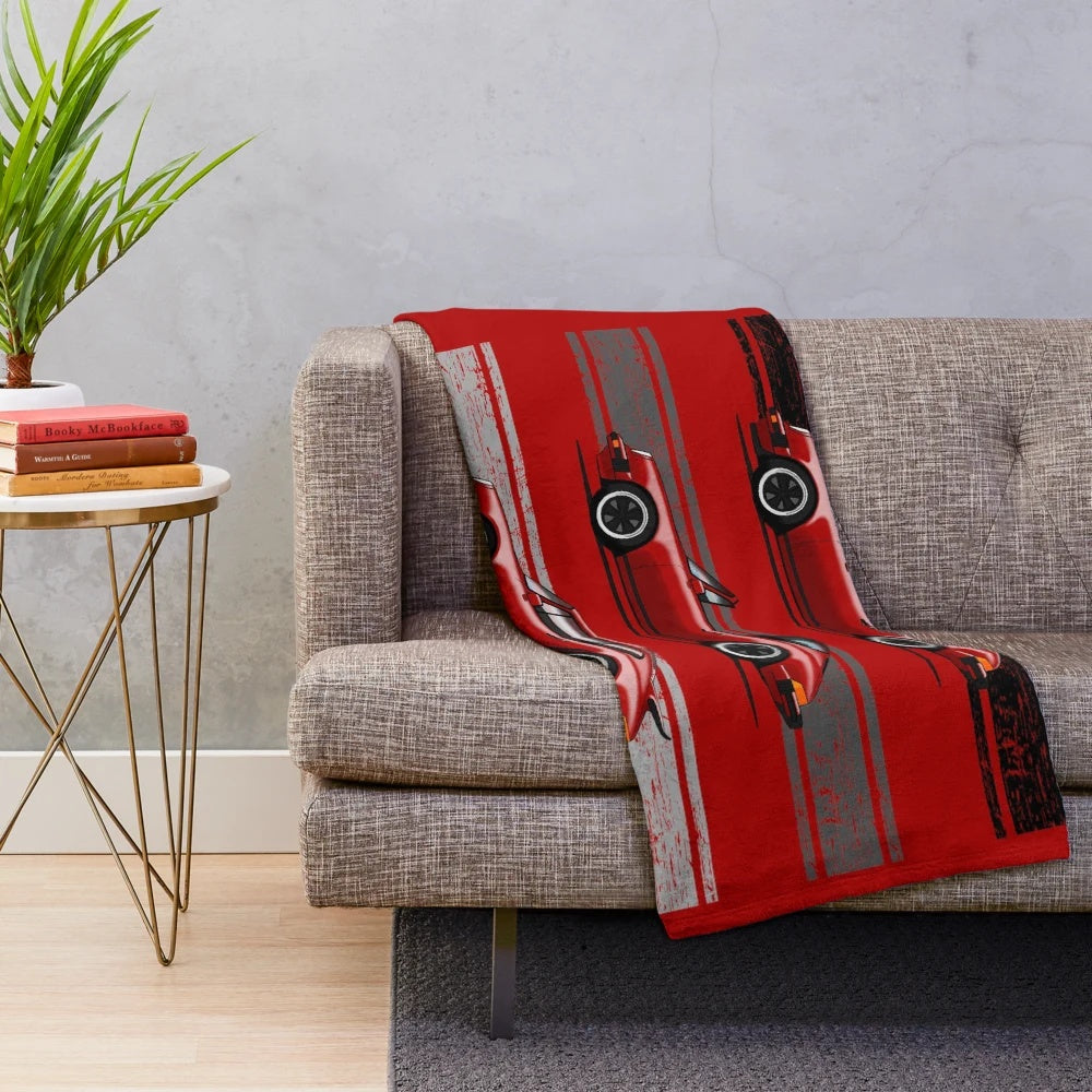 Plush blanket with artistic rendering of classic German sports cars