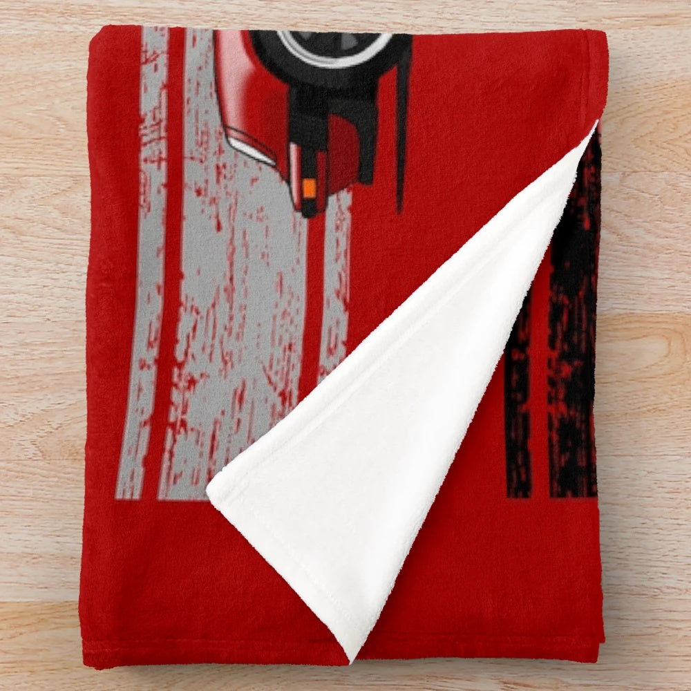 Plush blanket with artistic rendering of classic German sports cars