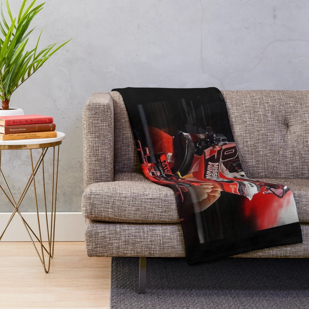 Plush blanket with a design featuring the Formula 1 driver Charles Leclerc