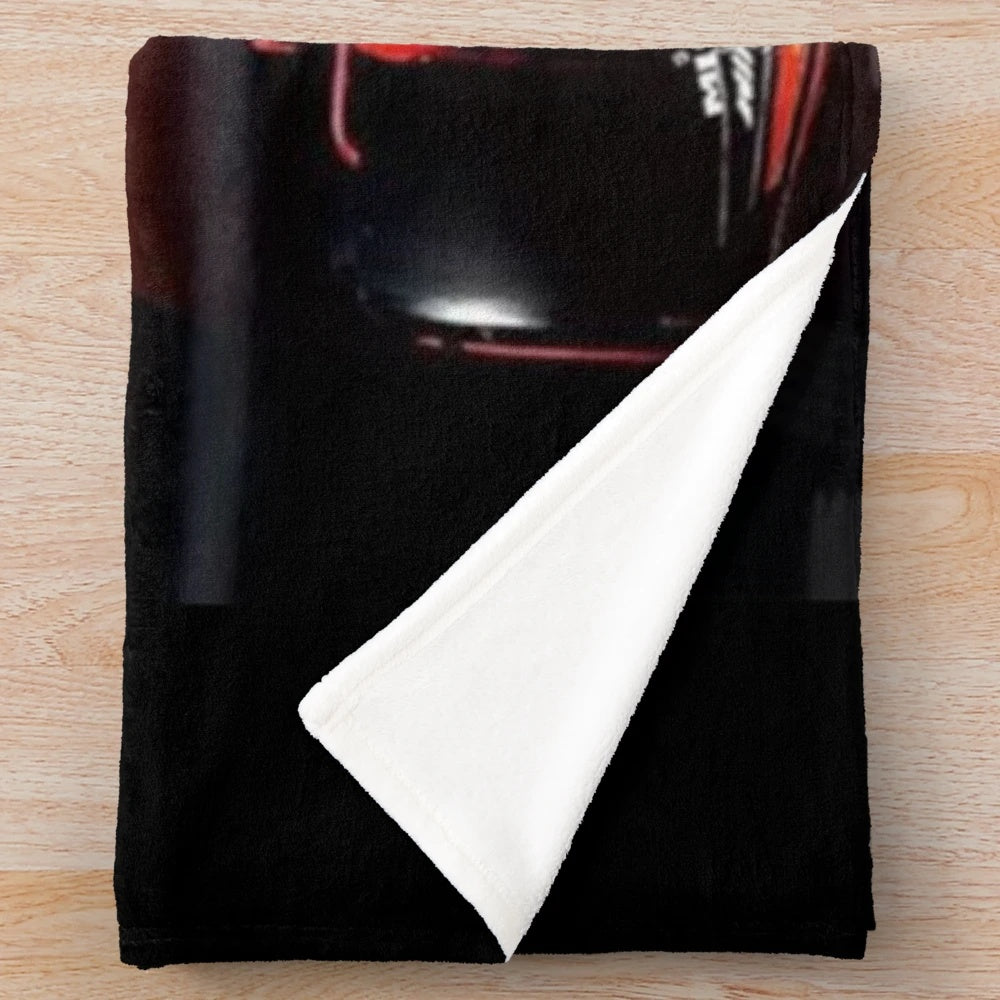 Plush blanket with a design featuring the Formula 1 driver Charles Leclerc