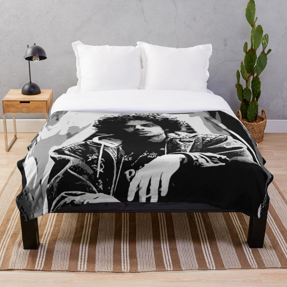 Plush blanket featuring artistic design inspired by musician Grandson