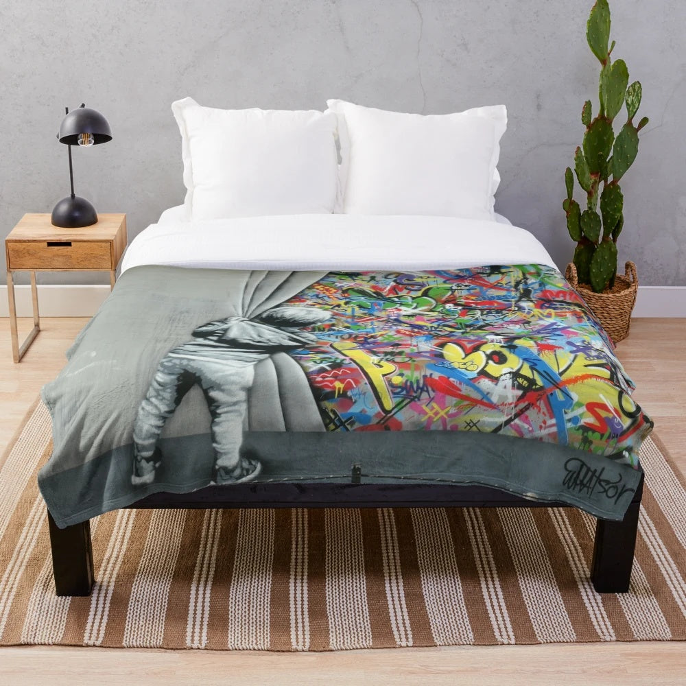 Plush blanket featuring the artwork of Norwegian street artist Martin Whatson's "Behind the Curtain" (Wynwood Walls Edition)