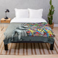 Plush blanket featuring the artwork of Norwegian street artist Martin Whatson's "Behind the Curtain" (Wynwood Walls Edition)