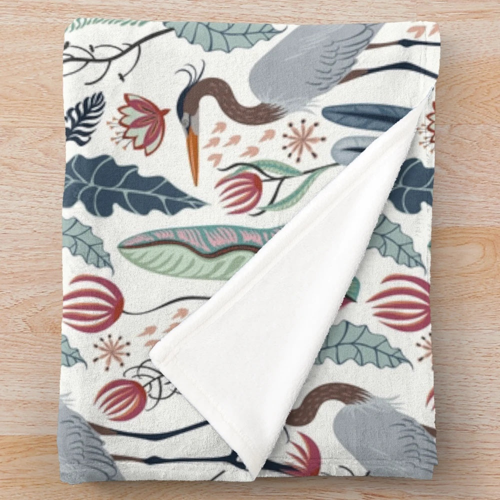 Plush blanket featuring a beautiful heron and nature-inspired design