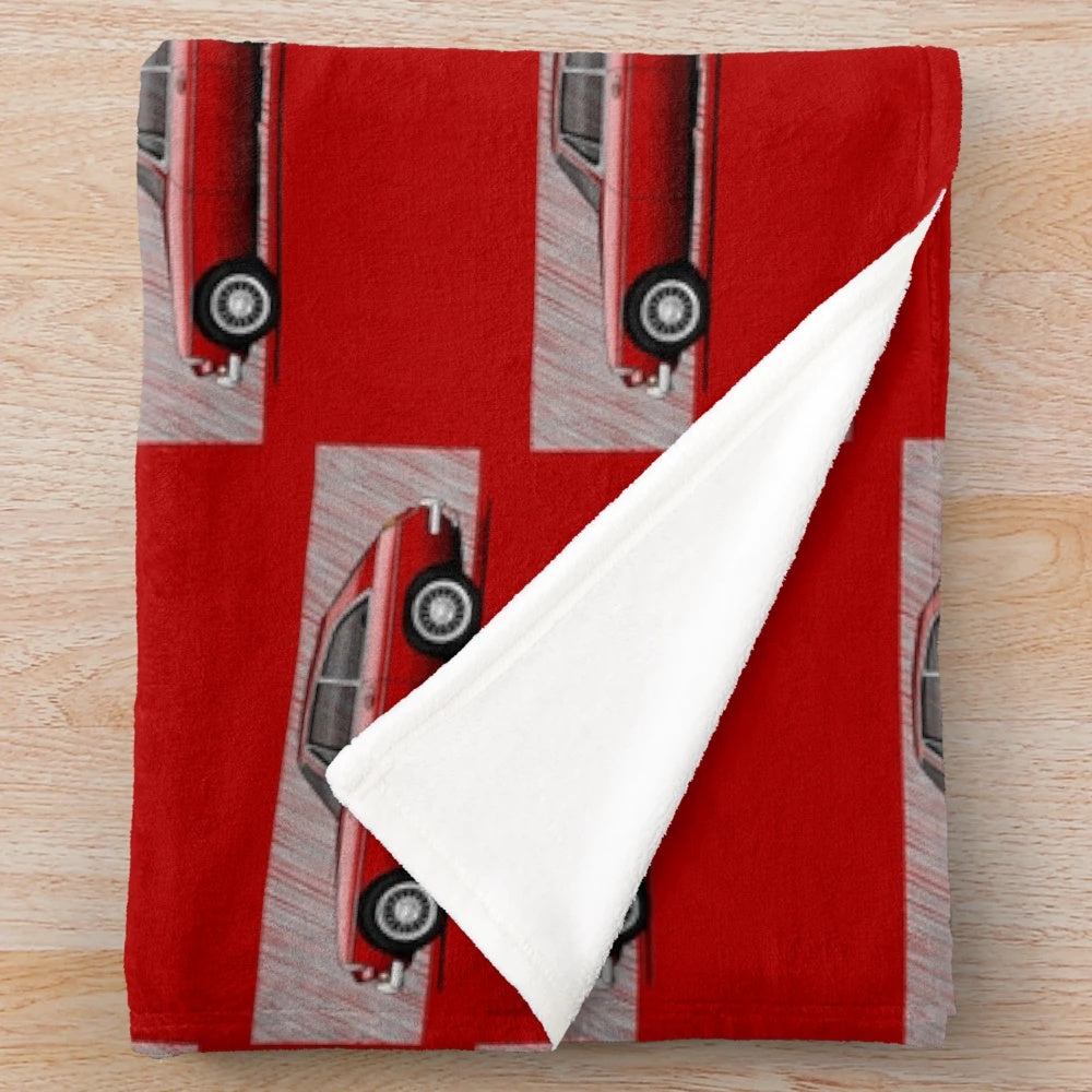 Plush blanket featuring an artistic illustration of the classic MGB GT sports coupe
