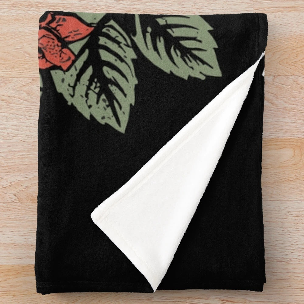 Soft and cozy plush blanket featuring an artistic sugar skull design with roses