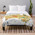 Colorful hand-drawn cartoon map of Australia on a soft plush blanket