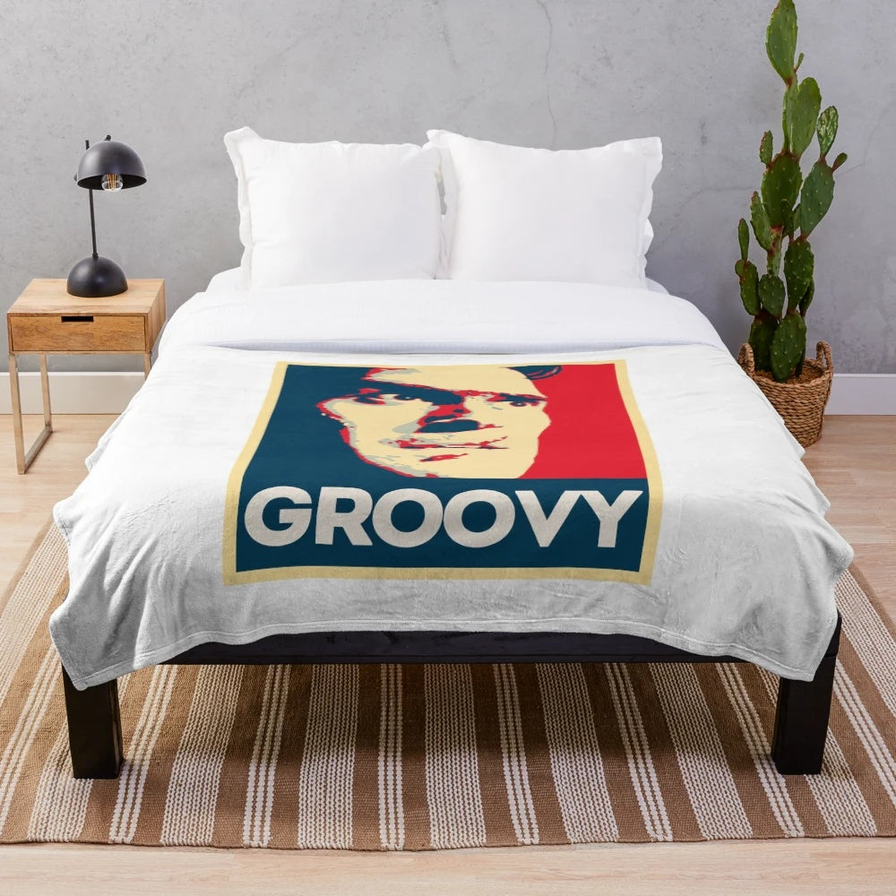 Ash Williams Groovy Plush Blanket inspired by the Evil Dead horror movie franchise