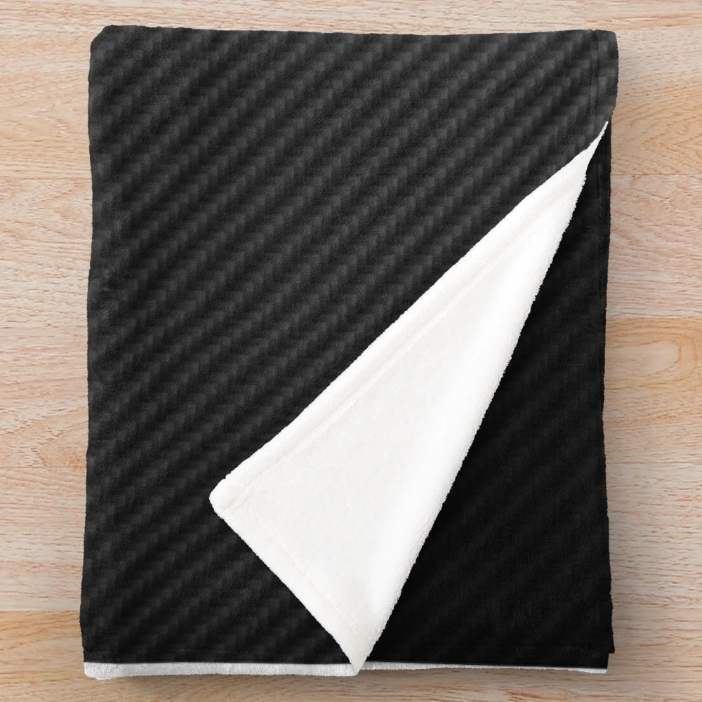 Aston Martin-inspired plush blanket with carbon fiber background