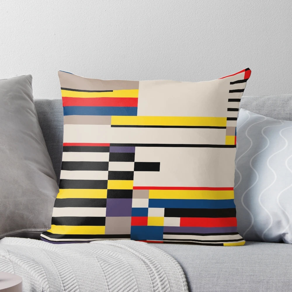 Vibrant abstract asymmetric design pillow featuring primary colors and a Bauhaus-inspired grid pattern