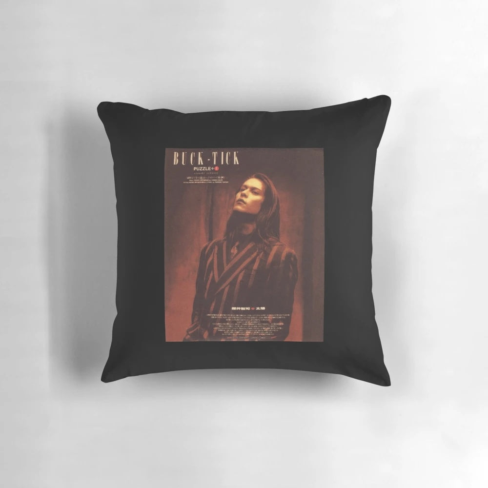 Atsushi Sakurai of the Japanese rock band Buck Tick on a decorative throw pillow