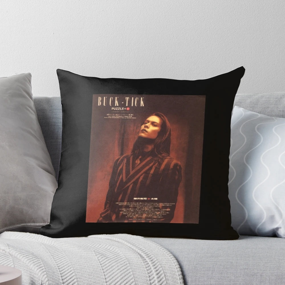 Atsushi Sakurai of the Japanese rock band Buck Tick on a decorative throw pillow