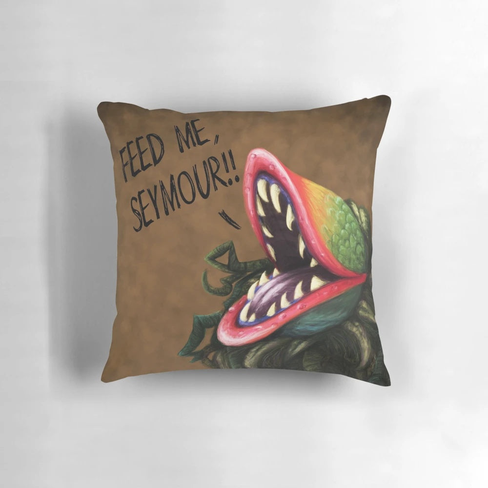 Decorative pillow featuring the carnivorous plant Audrey II from the classic musical Little Shop of Horrors
