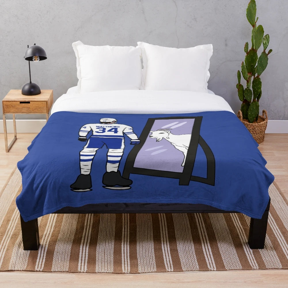 Auston Matthews inspired plush blanket with maple leaf and moustache design
