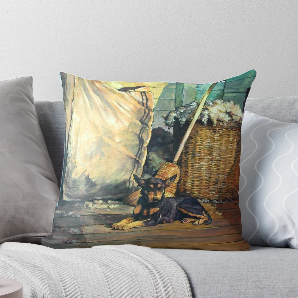 A pillow featuring an illustration of an Australian Kelpie, a herding dog breed known for its skills in sheep shearing and mustering.