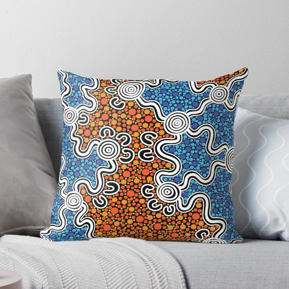 Vibrant indigenous aboriginal art printed on a plush, high-quality pillow for your home.