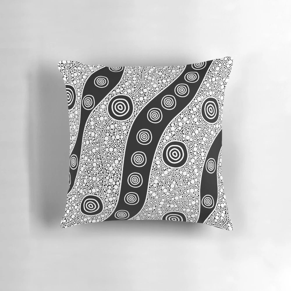 Vibrant, handcrafted aboriginal art pillow featuring traditional Australian indigenous designs.