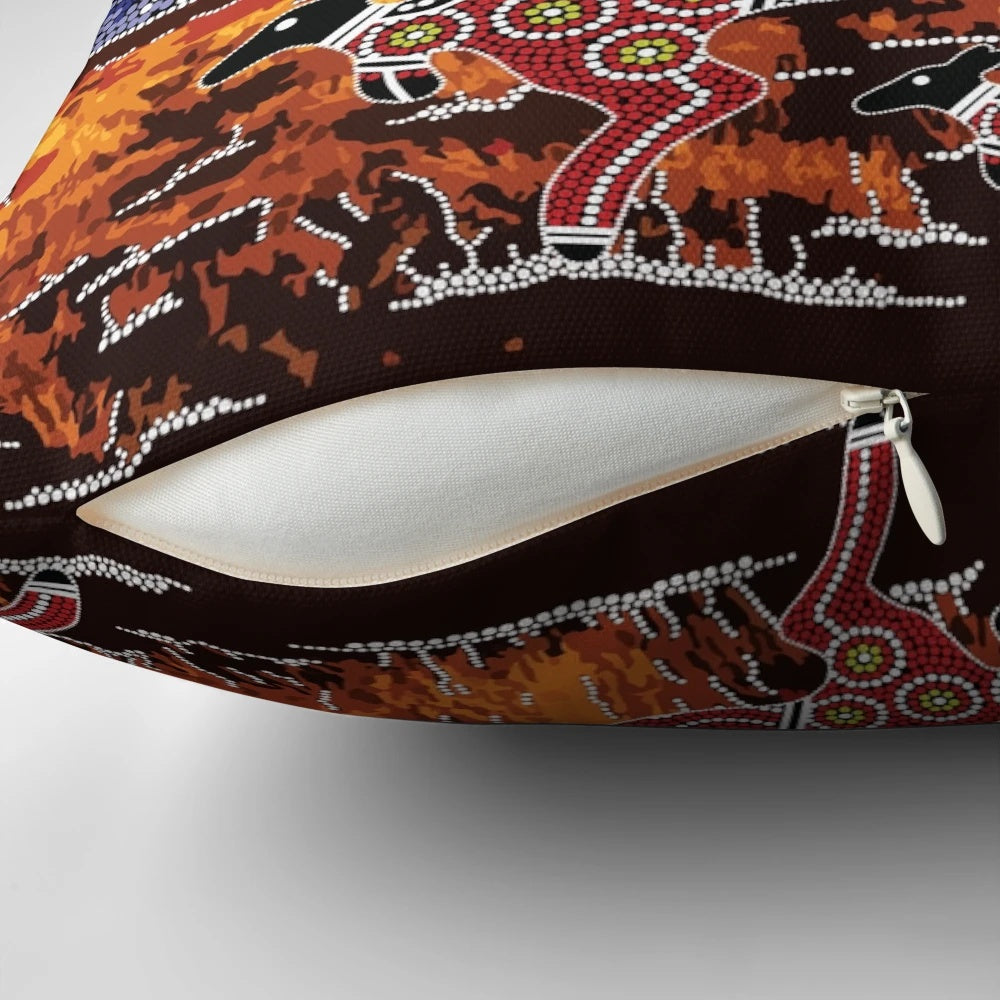 Pillow featuring vibrant aboriginal art design inspired by the iconic Uluru rock formation in the Australian outback.