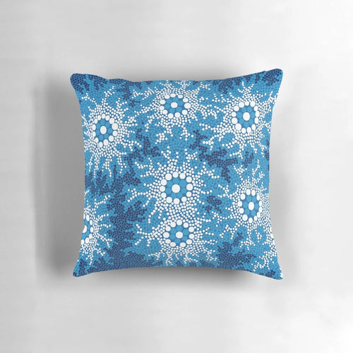 Vibrant blue aboriginal art pillow featuring traditional dot patterns and native Australian animals