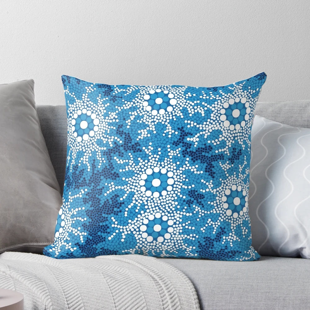 Vibrant blue aboriginal art pillow featuring traditional dot patterns and native Australian animals