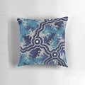 Vibrant blue aboriginal art pillow featuring traditional indigenous dot patterns and Australian wildlife like kangaroos and emus.