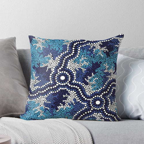 Vibrant blue aboriginal art pillow featuring traditional indigenous dot patterns and Australian wildlife like kangaroos and emus.