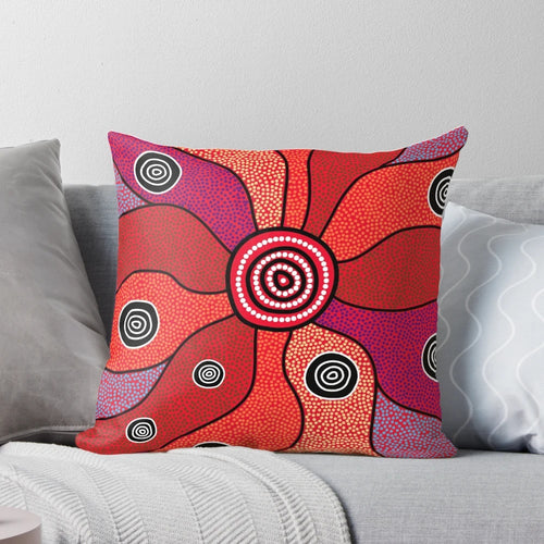 Vibrant aboriginal art pillow featuring traditional dot patterns and Australian native animals like kangaroo and emu
