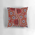 Pillow featuring aboriginal-inspired dot art design