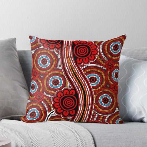 Pillow featuring aboriginal-inspired dot art design